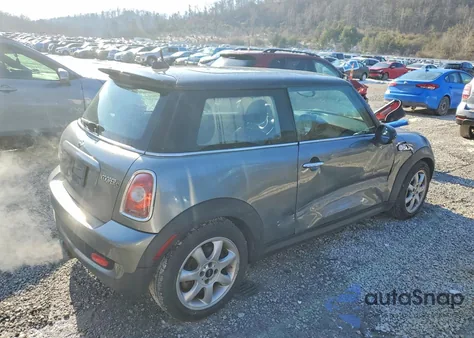 2010 Mini Cooper S z USA, uszkodzony, nr VIN WMWMF7C55ATZ73100